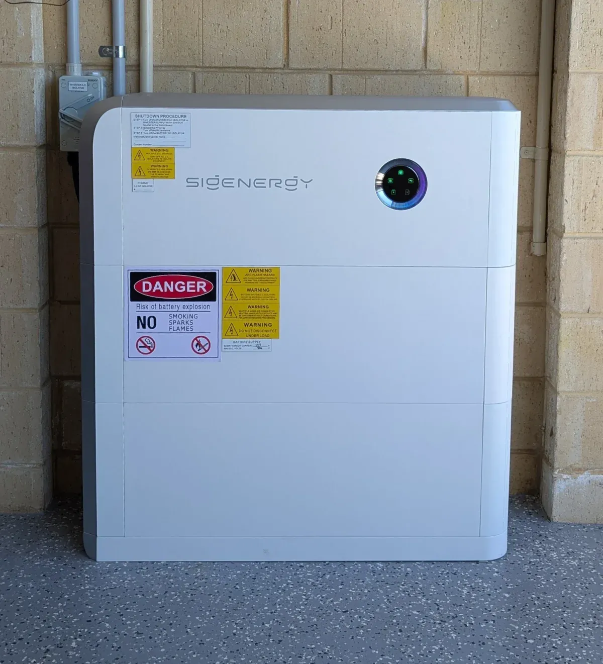 Home battery on a clean interior wall