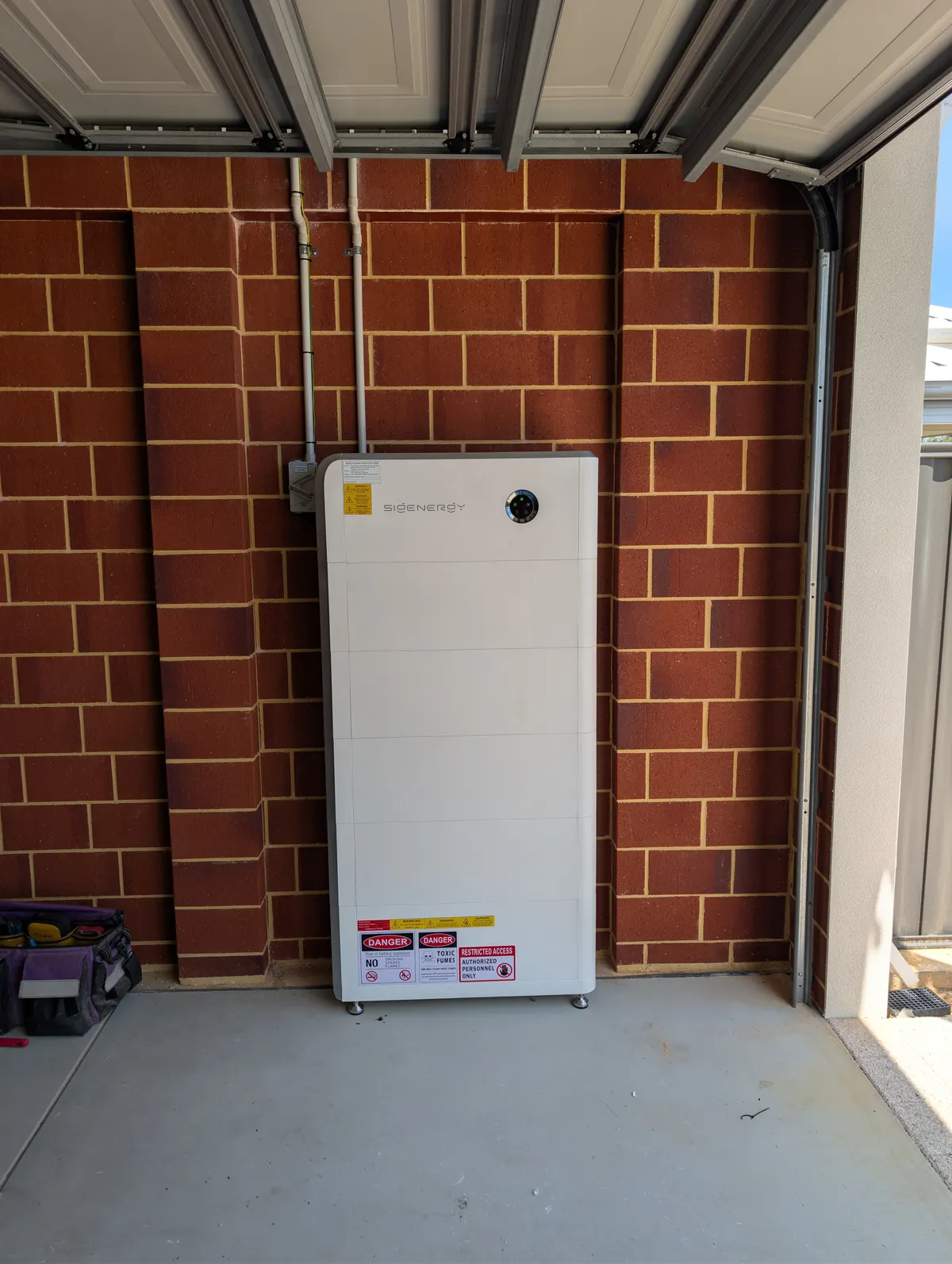 Sigenergy SigenStor battery installed on a garage wall